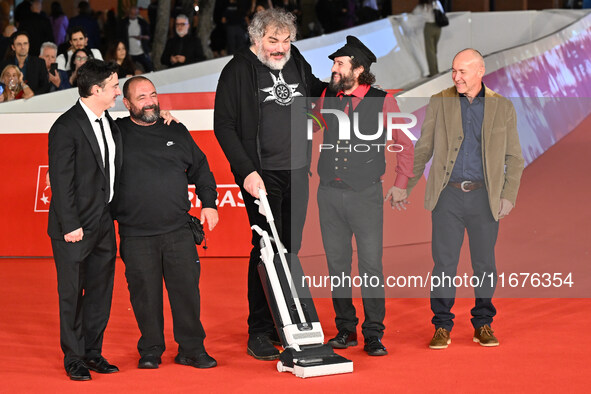 (L-R) Gianfranco Firriolo, Donatello Racina, Marco Cervetti, Vinicio Capossela, and a guest attend the ''Natale fuori orario'' red carpet du...