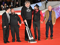 (L-R) Gianfranco Firriolo, Donatello Racina, Marco Cervetti, Vinicio Capossela, and a guest attend the ''Natale fuori orario'' red carpet du...