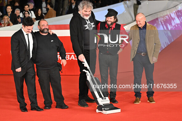 (L-R) Gianfranco Firriolo, Donatello Racina, Marco Cervetti, Vinicio Capossela, and a guest attend the ''Natale fuori orario'' red carpet du...