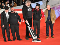 (L-R) Gianfranco Firriolo, Donatello Racina, Marco Cervetti, Vinicio Capossela, and a guest attend the ''Natale fuori orario'' red carpet du...