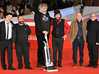 (L-R) Gianfranco Firriolo, Donatello Racina, Marco Cervetti, Vinicio Capossela, and a guest attend the ''Natale fuori orario'' red carpet du...