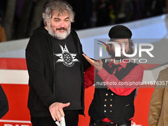 Marco Cervetti, Vinicio Capossela, and a guest attend the ''Natale fuori orario'' red carpet during the 19th Rome Film Festival at Auditoriu...