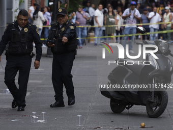 A police operation follows an attack on Diana Sanchez Barrios, leader of traders in the Historic Centre of Mexico City, Mexico, on October 1...