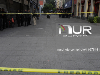 A police operation follows an attack on Diana Sanchez Barrios, leader of traders in the Historic Centre of Mexico City, Mexico, on October 1...