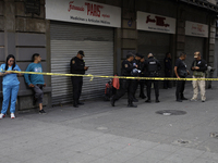 A police operation follows an attack on Diana Sanchez Barrios, leader of traders in the Historic Centre of Mexico City, Mexico, on October 1...