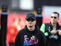 Sauber driver Zhou Guanyu, 24, arrives in the paddock at Circuit of the Americas in Austin, Texas, on October 17, 2024. (