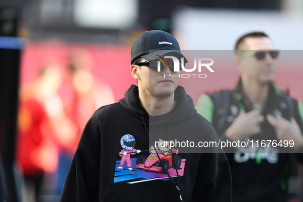 Sauber driver Zhou Guanyu, 24, arrives in the paddock at Circuit of the Americas in Austin, Texas, on October 17, 2024. 