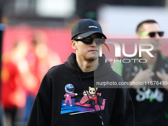 Sauber driver Zhou Guanyu, 24, arrives in the paddock at Circuit of the Americas in Austin, Texas, on October 17, 2024. (