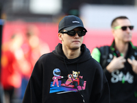 Sauber driver Zhou Guanyu, 24, arrives in the paddock at Circuit of the Americas in Austin, Texas, on October 17, 2024. (