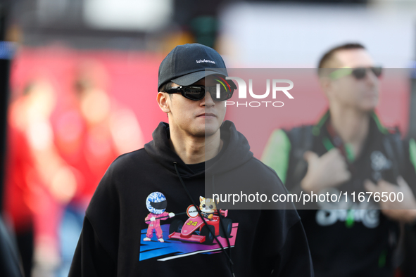 Sauber driver Zhou Guanyu, 24, arrives in the paddock at Circuit of the Americas in Austin, Texas, on October 17, 2024. 