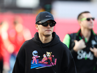 Sauber driver Zhou Guanyu, 24, arrives in the paddock at Circuit of the Americas in Austin, Texas, on October 17, 2024. (