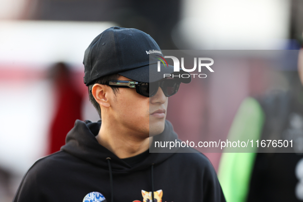 Sauber driver Zhou Guanyu, 24, arrives in the paddock at Circuit of the Americas in Austin, Texas, on October 17, 2024. 