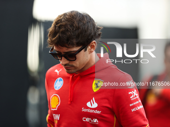 Ferrari driver Charles Leclerc (16) arrives in the paddock at Circuit of the Americas in Austin, Texas, on October 17, 2024. (