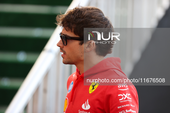 Ferrari driver Charles Leclerc (16) arrives in the paddock at Circuit of the Americas in Austin, Texas, on October 17, 2024. 