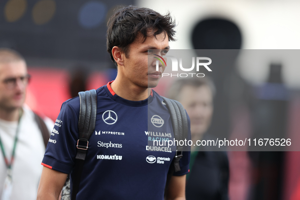 Williams driver Alex Albon arrives in the paddock at Circuit of the Americas in Austin, Texas, on October 17, 2024. 