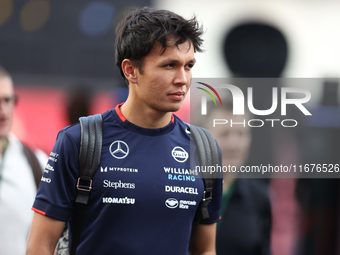 Williams driver Alex Albon arrives in the paddock at Circuit of the Americas in Austin, Texas, on October 17, 2024. (