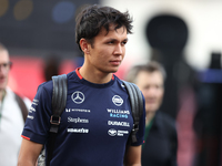 Williams driver Alex Albon arrives in the paddock at Circuit of the Americas in Austin, Texas, on October 17, 2024. (