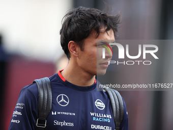 Williams driver Alex Albon arrives in the paddock at Circuit of the Americas in Austin, Texas, on October 17, 2024. (