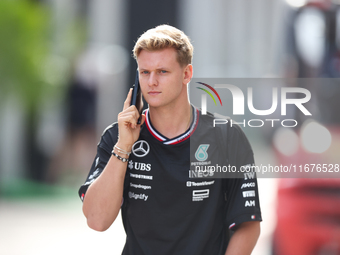 Mick Schumacher arrives in the paddock at Circuit of the Americas in Austin, Texas, on October 17, 2024. (