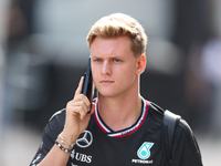 Mick Schumacher arrives in the paddock at Circuit of the Americas in Austin, Texas, on October 17, 2024. (