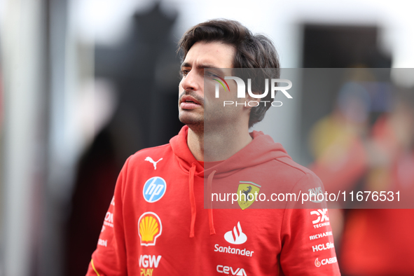 Ferrari driver Carlos Sainz (55) arrives in the paddock at Circuit of the Americas in Austin, Texas, on October 17, 2024. 