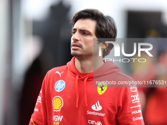 Ferrari driver Carlos Sainz (55) arrives in the paddock at Circuit of the Americas in Austin, Texas, on October 17, 2024. (