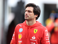 Ferrari driver Carlos Sainz (55) arrives in the paddock at Circuit of the Americas in Austin, Texas, on October 17, 2024. (