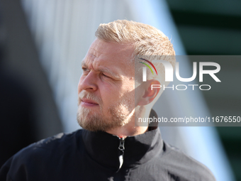 Haas driver Kevin Magnussen (20) arrives in the paddock at Circuit of the Americas in Austin, Texas, on October 17, 2024. (