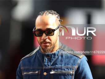 Mercedes driver Lewis Hamilton (44) arrives in the paddock at Circuit of the Americas in Austin, Texas, on October 17, 2024. (