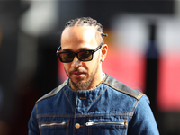 Mercedes driver Lewis Hamilton (44) arrives in the paddock at Circuit of the Americas in Austin, Texas, on October 17, 2024. (