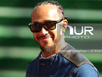 Mercedes driver Lewis Hamilton (44) arrives in the paddock at Circuit of the Americas in Austin, Texas, on October 17, 2024. (