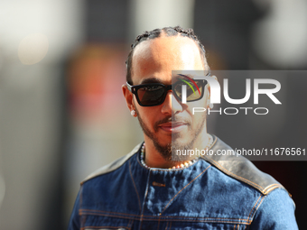 Mercedes driver Lewis Hamilton (44) arrives in the paddock at Circuit of the Americas in Austin, Texas, on October 17, 2024. (