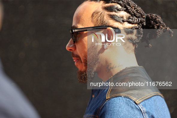 Mercedes driver Lewis Hamilton (44) arrives in the paddock at Circuit of the Americas in Austin, Texas, on October 17, 2024. 