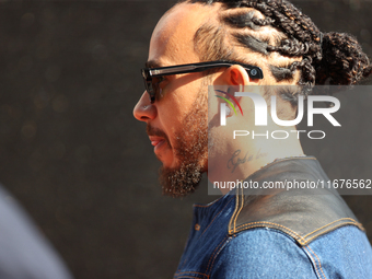 Mercedes driver Lewis Hamilton (44) arrives in the paddock at Circuit of the Americas in Austin, Texas, on October 17, 2024. (