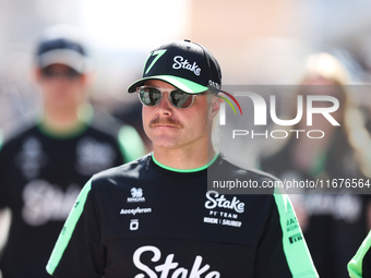 Sauber driver Valtteri Bottas (77) walks in the paddock at Circuit of the Americas in Austin, Texas, on October 17, 2024. (