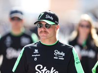 Sauber driver Valtteri Bottas (77) walks in the paddock at Circuit of the Americas in Austin, Texas, on October 17, 2024. (