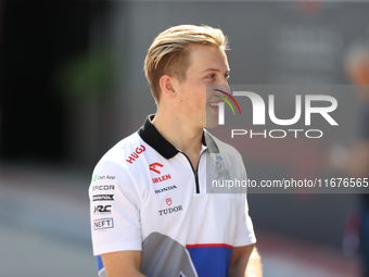 Visa Cash App RB driver Liam Lawson, 30, walks in the paddock at Circuit of the Americas in Austin, Texas, on October 17, 2024. (