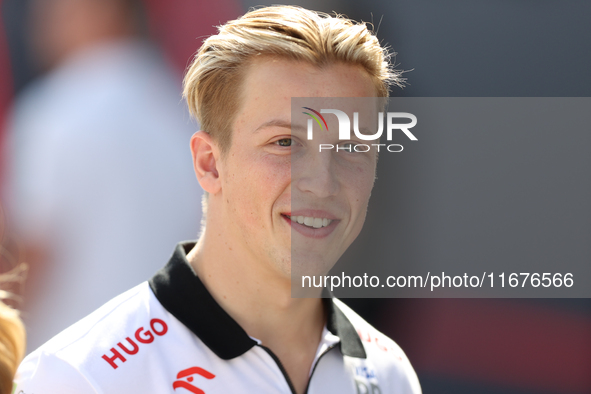 Visa Cash App RB driver Liam Lawson, 30, walks in the paddock at Circuit of the Americas in Austin, Texas, on October 17, 2024. 