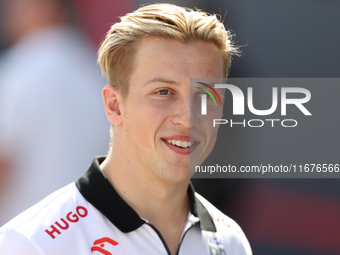 Visa Cash App RB driver Liam Lawson, 30, walks in the paddock at Circuit of the Americas in Austin, Texas, on October 17, 2024. (