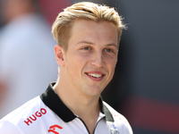 Visa Cash App RB driver Liam Lawson, 30, walks in the paddock at Circuit of the Americas in Austin, Texas, on October 17, 2024. (