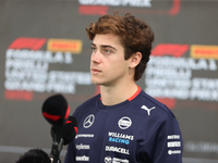 Williams driver Franco Colapinto (43) speaks to the press in the paddock at Circuit of the Americas in Austin, Texas, on October 17, 2024. (