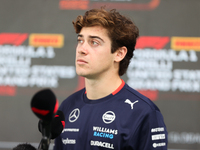 Williams driver Franco Colapinto (43) speaks to the press in the paddock at Circuit of the Americas in Austin, Texas, on October 17, 2024. (