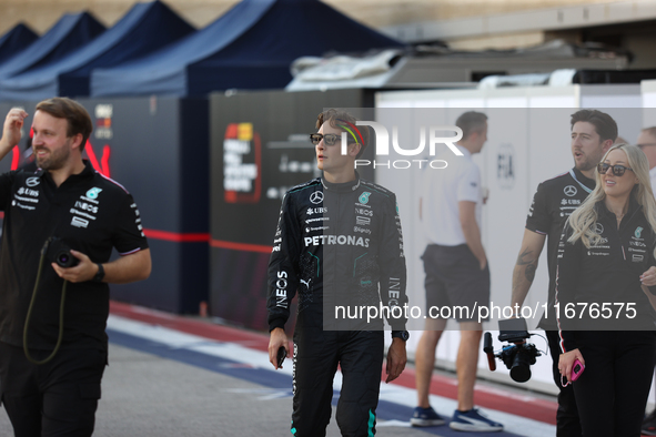 Mercedes driver George Russell (63) walks in the paddock at Circuit of the Americas in Austin, Texas, on October 17, 2024. 