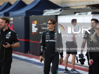 Mercedes driver George Russell (63) walks in the paddock at Circuit of the Americas in Austin, Texas, on October 17, 2024. (