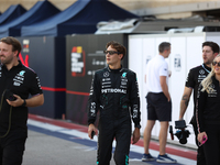 Mercedes driver George Russell (63) walks in the paddock at Circuit of the Americas in Austin, Texas, on October 17, 2024. (