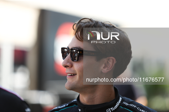 Mercedes driver George Russell (63) walks in the paddock at Circuit of the Americas in Austin, Texas, on October 17, 2024. 