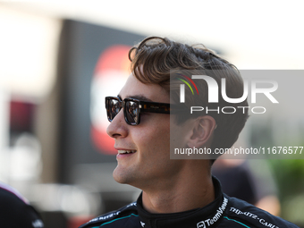 Mercedes driver George Russell (63) walks in the paddock at Circuit of the Americas in Austin, Texas, on October 17, 2024. (