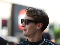 Mercedes driver George Russell (63) walks in the paddock at Circuit of the Americas in Austin, Texas, on October 17, 2024. (