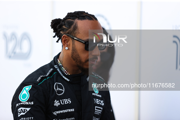 Lewis Hamilton walks in the paddock at Circuit of the Americas in Austin, Texas, on October 17, 2024. 