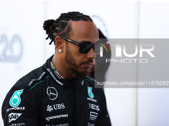 Lewis Hamilton walks in the paddock at Circuit of the Americas in Austin, Texas, on October 17, 2024. (